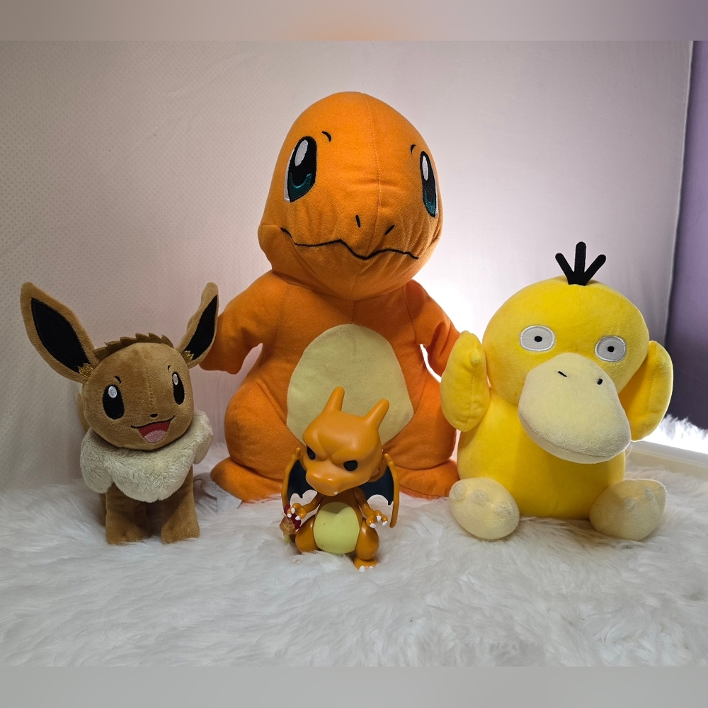 4 Pokemons. Eevee Charmander Psyduck Standing Plush Stuffed Animal/Pop Charizard